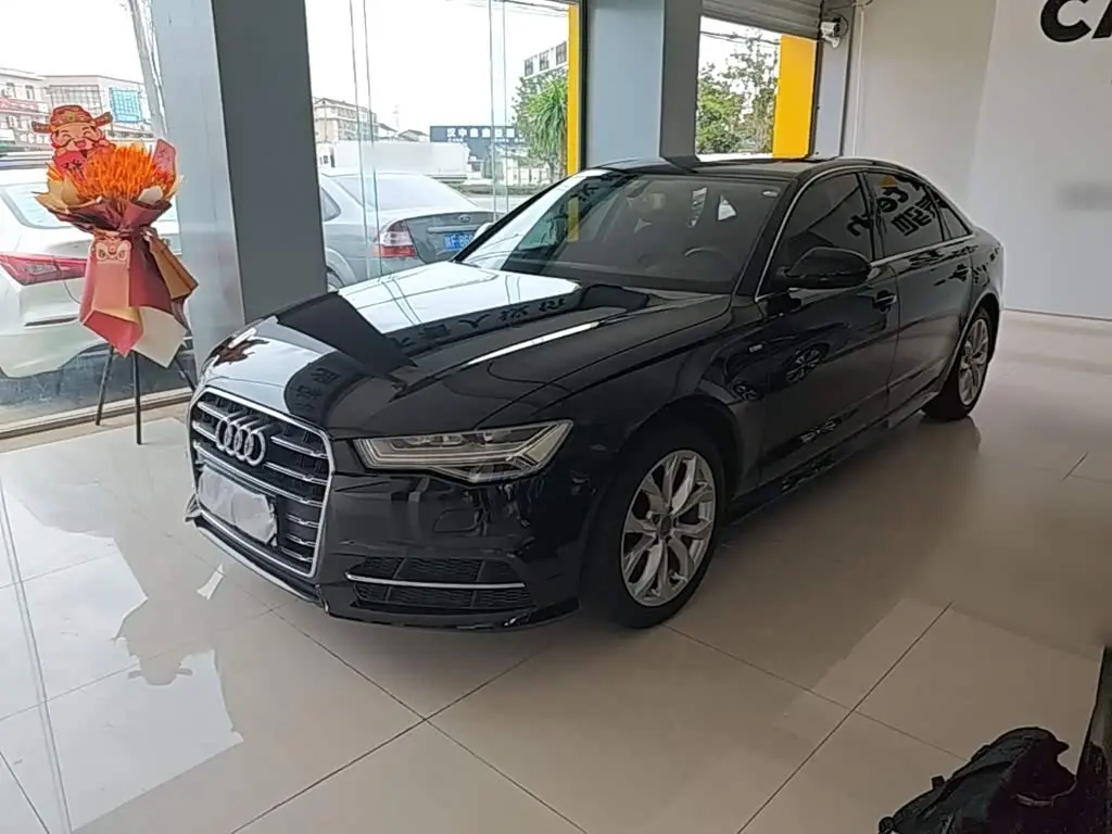Audi A6L 2018 — Фото 1/20