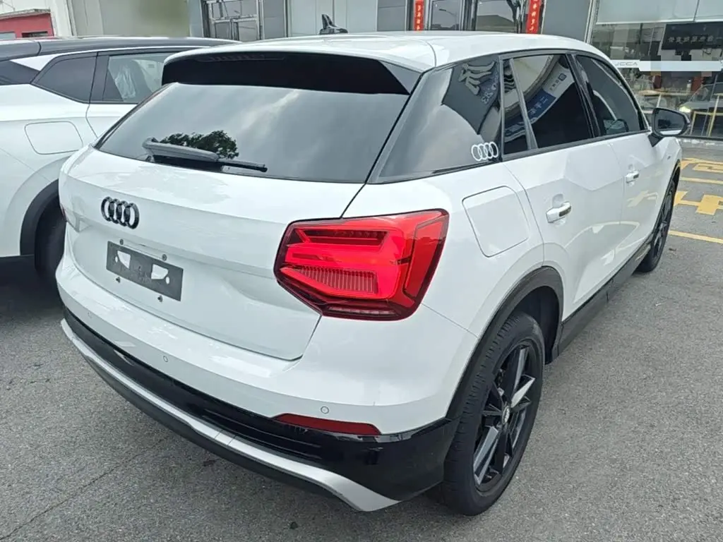 Audi Q2L 2021 — Фото 7/20