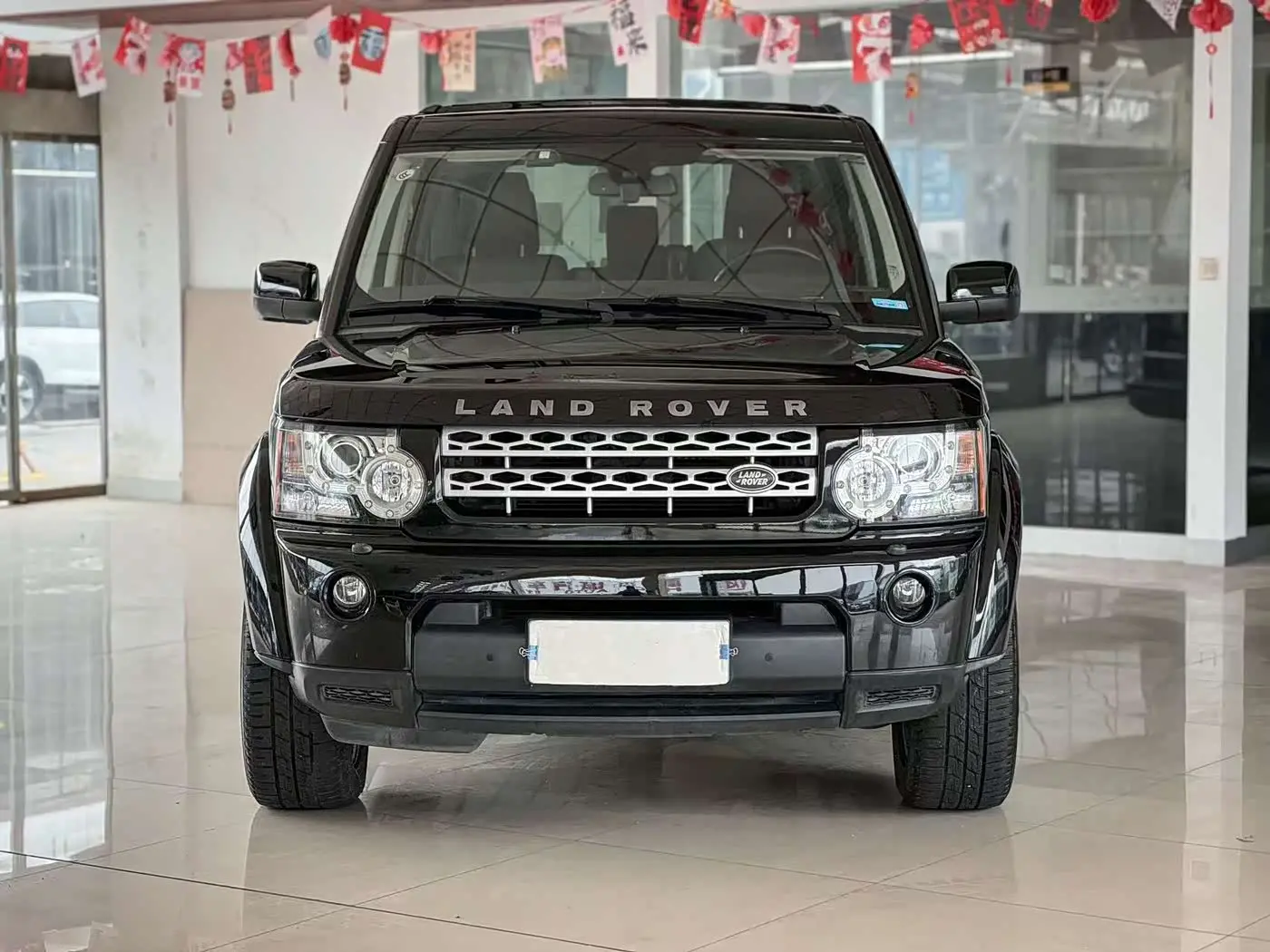 Land Rover Discovery 2013 — Фото 2/15