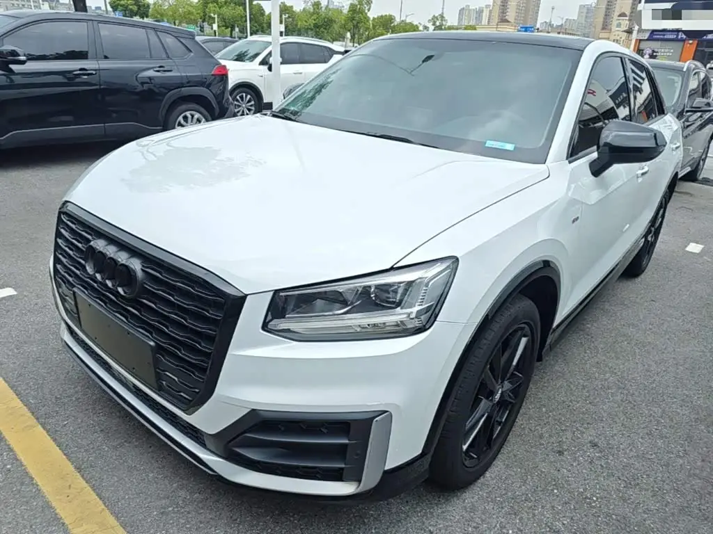 Audi Q2L 2021 — Фото 2/20