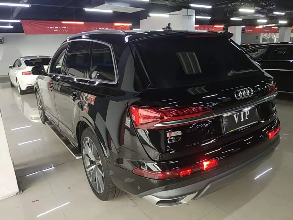 Audi Q7 2023 — Фото 5/20