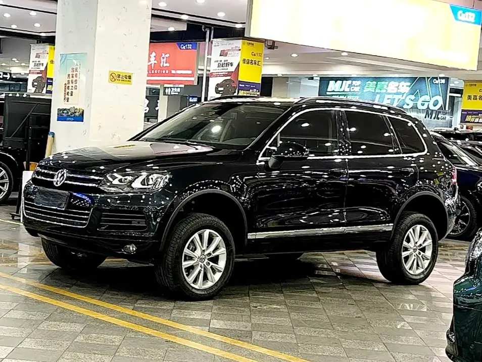 Volkswagen Touareg 2014 — Фото 1/10