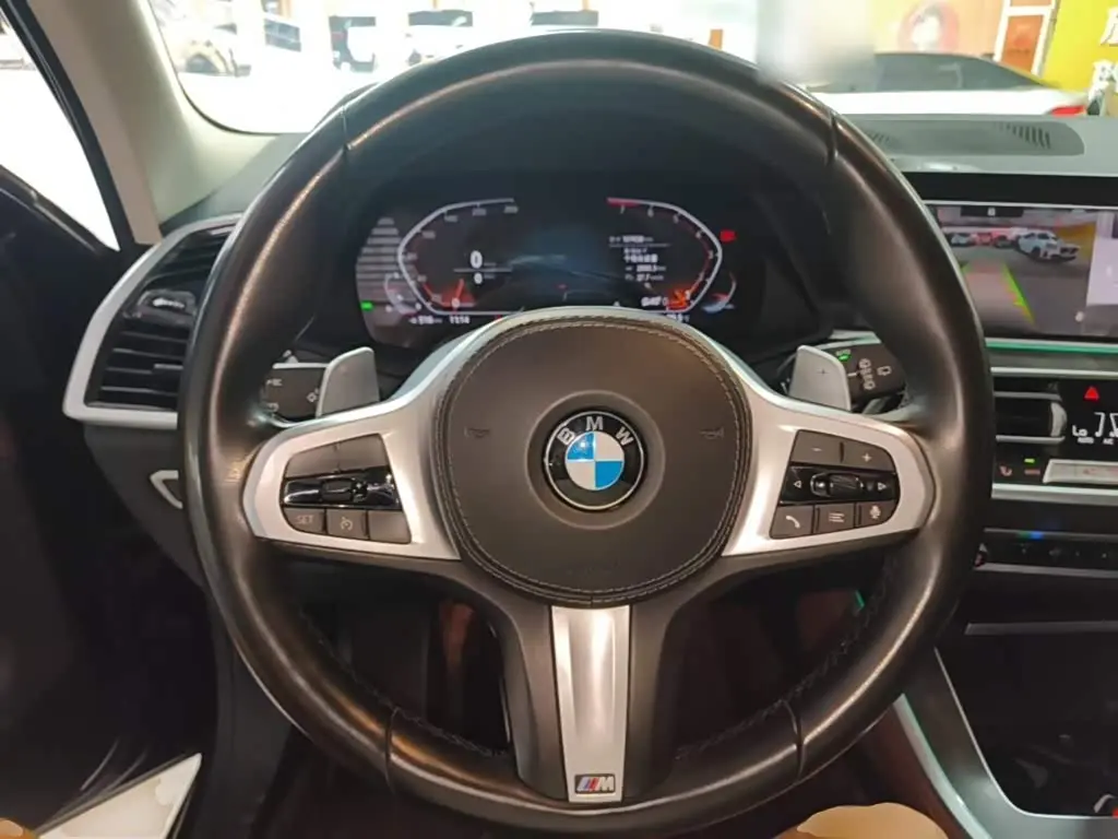 BMW X5 2022 — Фото 11/20