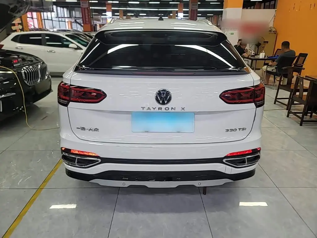 Volkswagen Tayron X 2022 — Фото 6/20