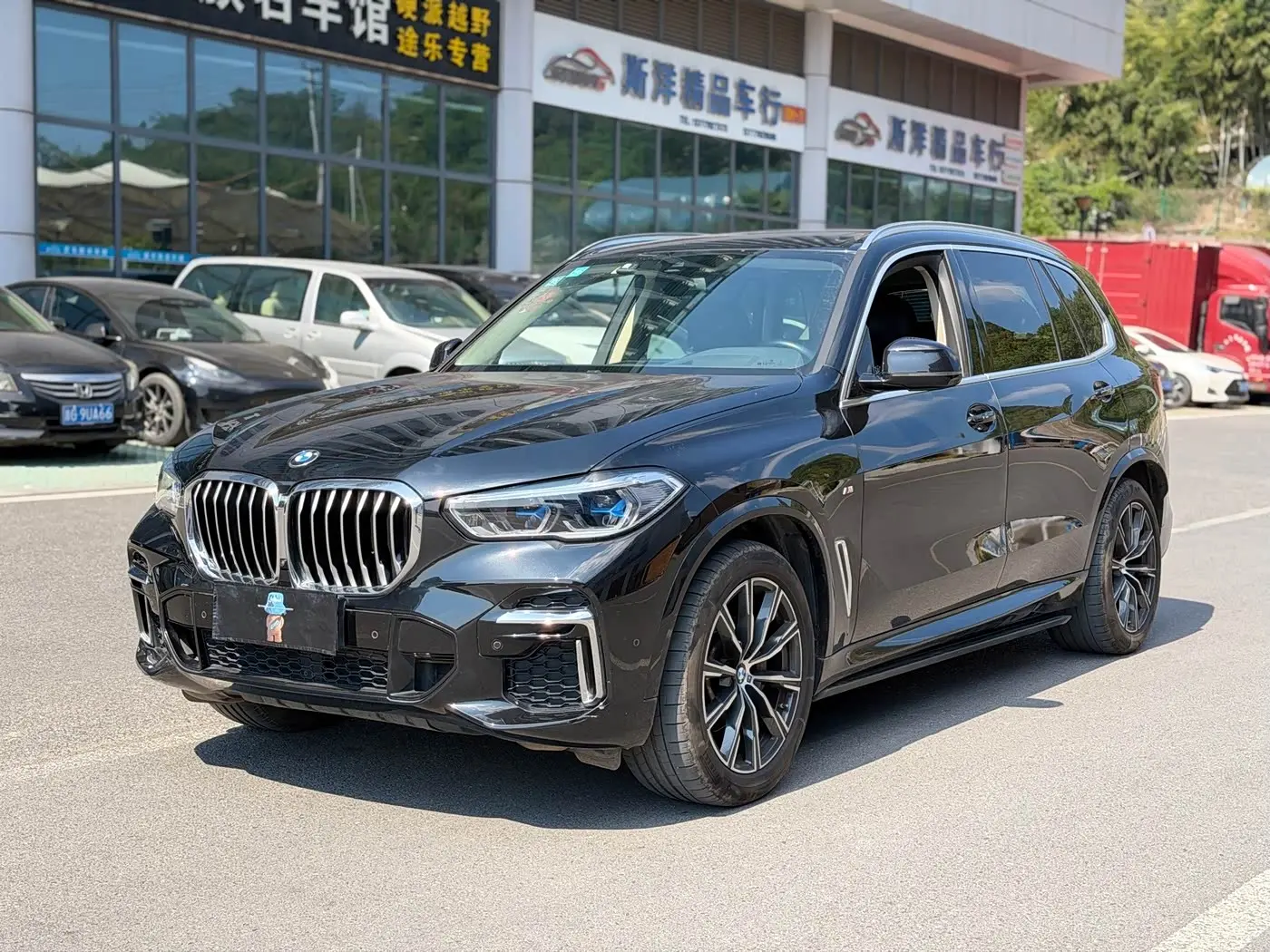 BMW X5 2023 — Фото 1/11