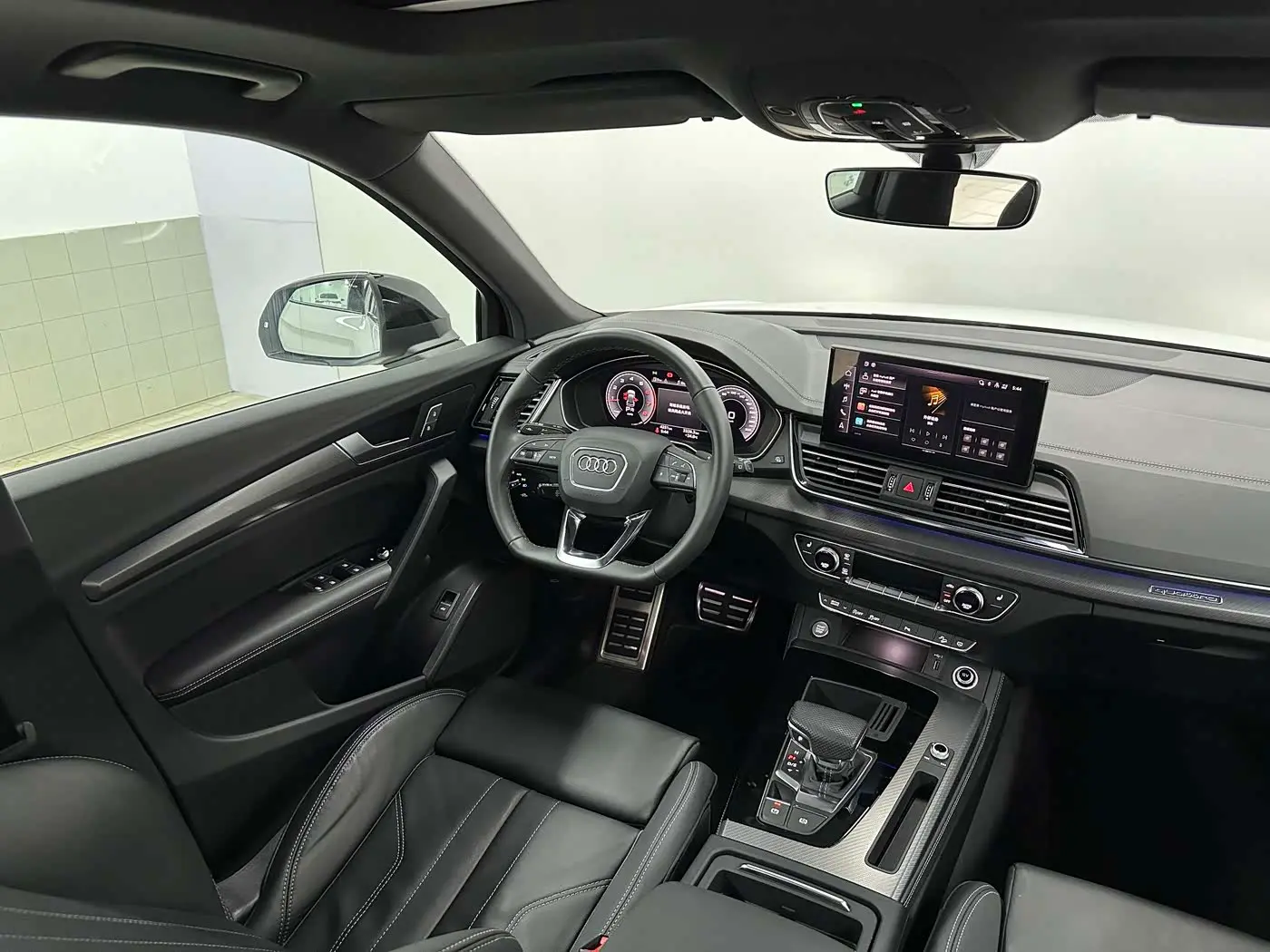 Audi Q5L 2024 — ფოტო 7/20