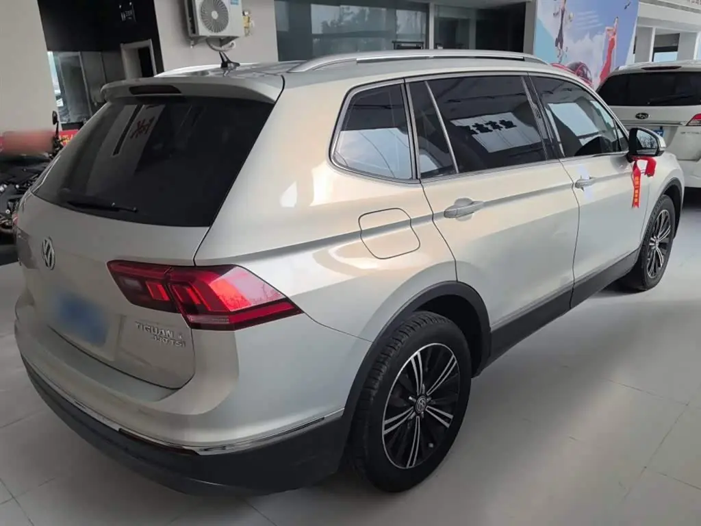 Volkswagen Tiguan L 2019 — Фото 7/20