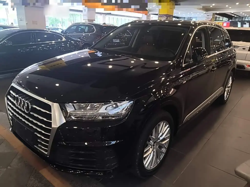 Audi Q7 2019 — Фото 2/20