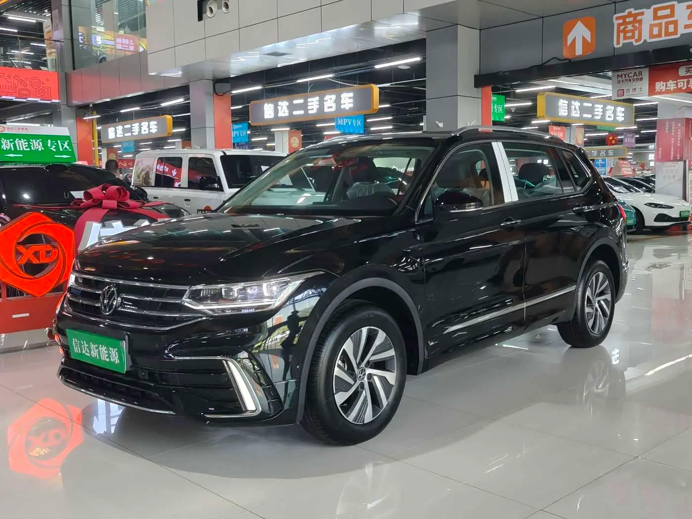 Volkswagen Tiguan L PHEV 2025 — Photo 1/20