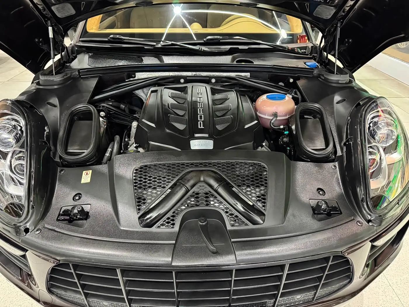 Porsche Macan 2016 — Фото 13/17